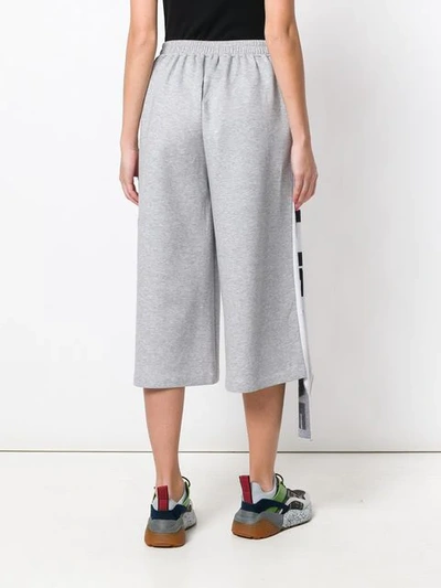 Shop Stella Mccartney Cropped Flared Trousers In Grey