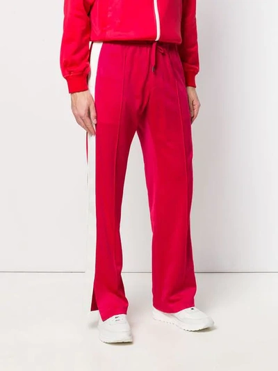 Shop Versace Two Tone Track Pants In Red