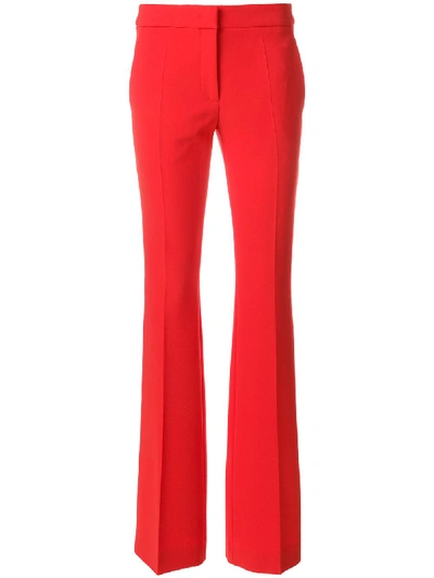 Shop Moschino Slim-fit High Trousers