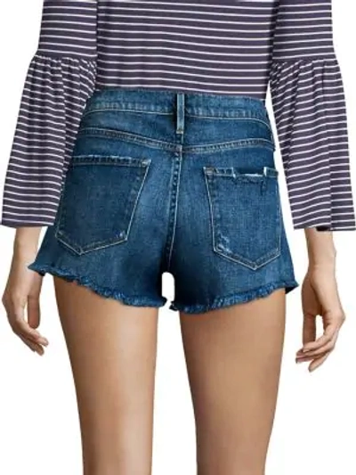 Shop Frame Le Cutoff Distressed Denim Shorts In Sandown