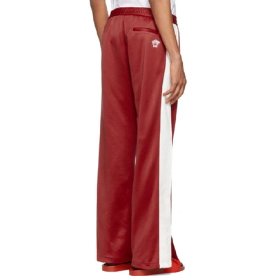 Shop Versace Red And White Side Band Track Pants In A933 Red/wh