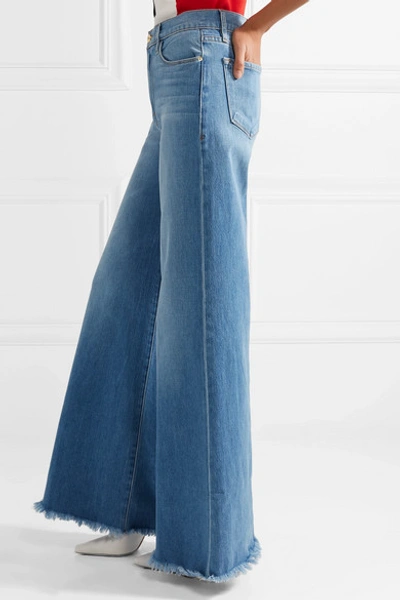 Shop Frame Le Palazzo Frayed High-rise Wide-leg Jeans In Mid Denim