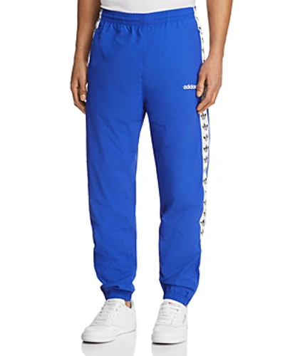 Shop Adidas Originals Tnt Wind Track Pants In Bold Blue