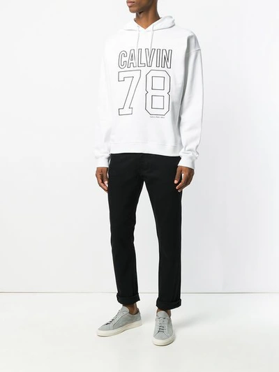 Shop Calvin Klein Jeans Est.1978 Calvin Klein Jeans Embroidered Logo Hoodie - White
