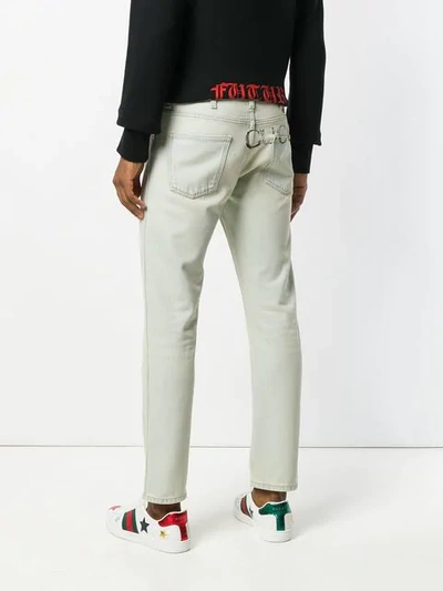 Shop Gucci Tapered Washed Jeans - Blue