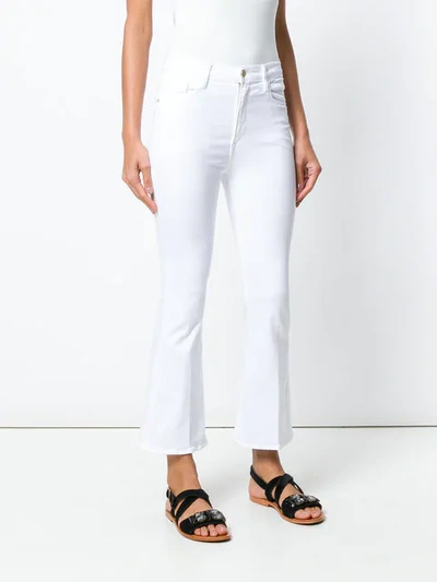 Shop Frame Flared High Rise Jeans In Bianco