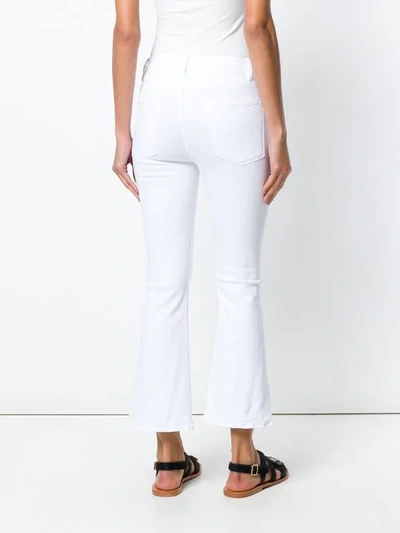 Shop Frame Flared High Rise Jeans In Bianco