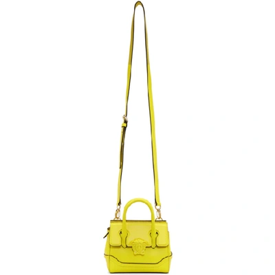 Shop Versace Yellow Mini Empire Bag