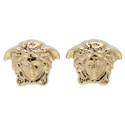 Shop Versace Gold Mini Medusa Earrings In D00oc Light
