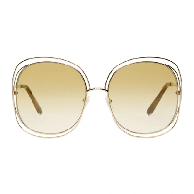 Shop Chloé Gold Oversized Round Sunglasses