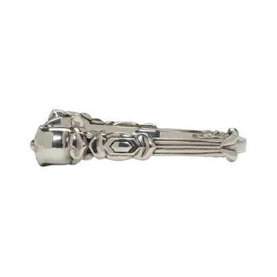 Shop Alexander Mcqueen Silver Textured Twin Skull Bracelet In 0446 Silver