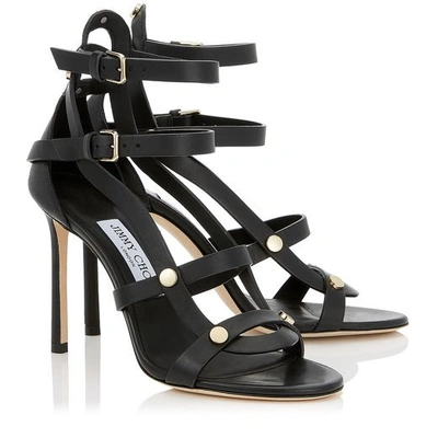 Shop Jimmy Choo Motoko 100 Black Vachetta Leather Sandals With Gold Studs In Black/gold