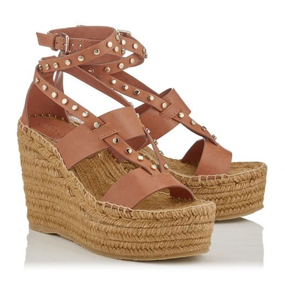 Shop Jimmy Choo Danica 110 Tan Vachetta Leather Wedge Sandals With Gold Studs In Tan/gold