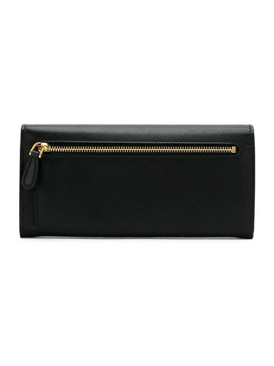 Shop Prada Saffiano Continental Wallet - Black