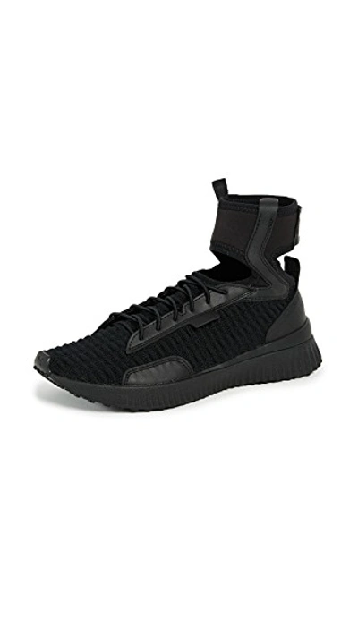 Shop Puma Trainer Mid Sneakers In  Black/ White