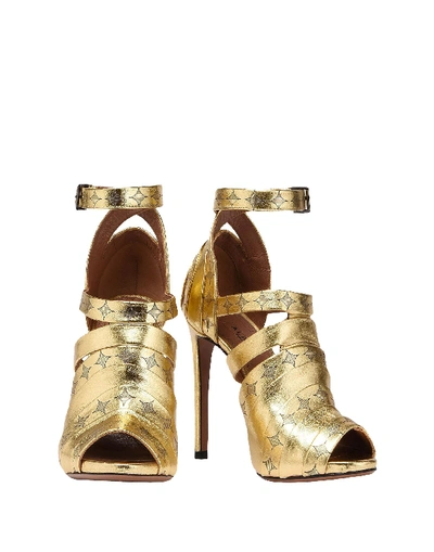 Shop Alaïa Sandals In Gold
