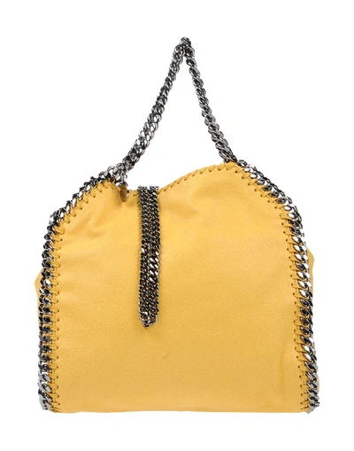 Shop Stella Mccartney Handbag In Yellow