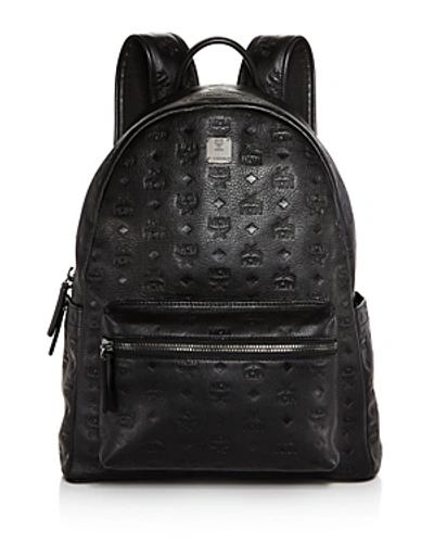 Shop Mcm Ottomar Monogrammed Leather Backpack In Black