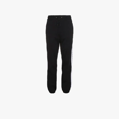 Shop Msgm Brand Stripe Track Trousers In Black