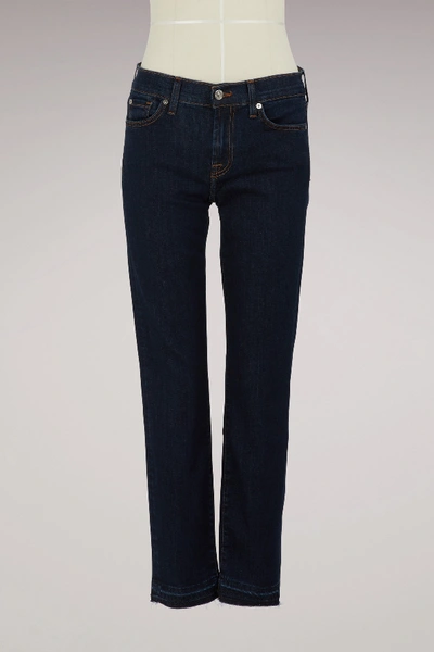 Shop 7 For All Mankind Mid-rise Roxanne Crop Unrolled Raw Indigo Jeans