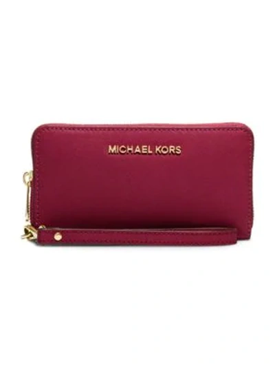 Shop Michael Michael Kors Jet Set Travel Large Saffiano Leather Smartphone Wristlet In Red