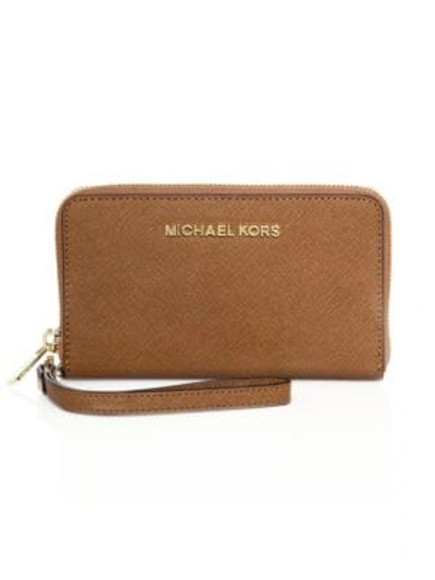 Shop Michael Michael Kors Textured Leather Zip Wristlet In Soft Pink