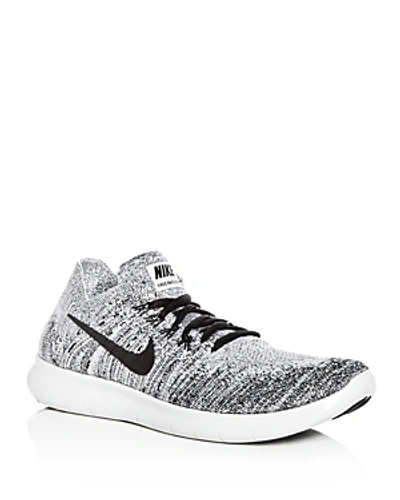 Shop Nike Men's Free Rn Flyknit Lace Up Sneakers In Oreo White/black