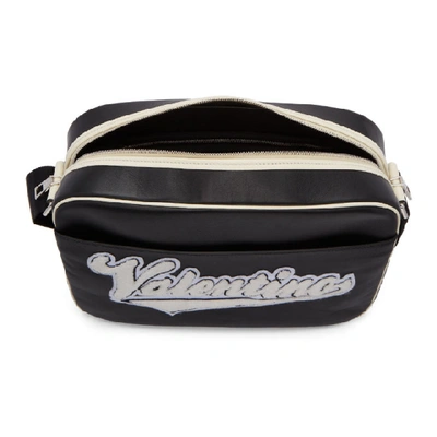 Shop Valentino Black  Garavani Varsity Messenger Bag