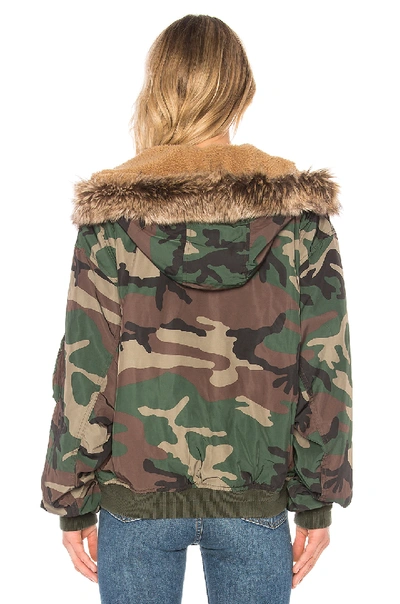 Shop Yeezy Season 5 Hood Bomber With Faux Fur In Army