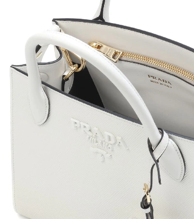 Shop Prada Saffiano Leather Tote In White