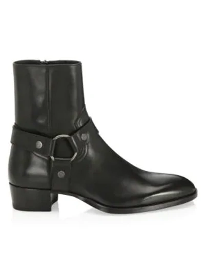 Shop Saint Laurent Wyatt 40 Leather Harness Boots In Black