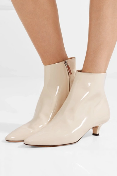 Shop The Row Coco Patent-leather Ankle Boots In Ivory