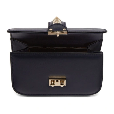 Shop Valentino Navy  Garavani Small Lock Bag In M30 Navy