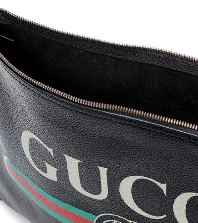Shop Gucci Printed Leather Pouch In Black