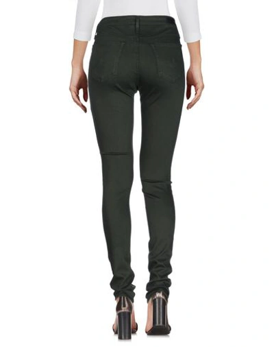 Shop Ag Denim Pants In Green