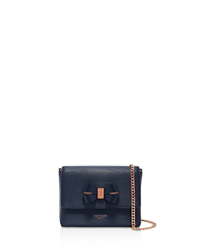 Shop Ted Baker Bowii Bow Detail Mini Bark Leather Crossbody In Navy/rose Gold