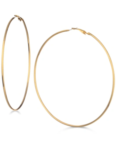 Shop Guess 3 1/4" Large Hoop Earrings In Gold