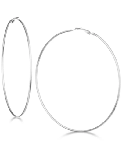 Shop Guess 3 1/4" Large Hoop Earrings In Silver