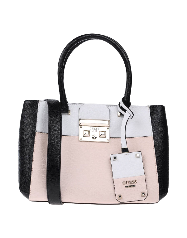 Guess Handbags In Pink ModeSens