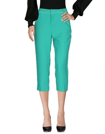 Shop Guess Cropped Pants & Culottes In Green