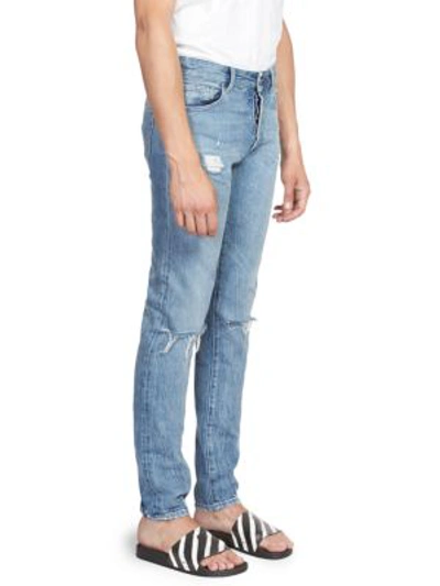 Shop Marcelo Burlon County Of Milan Blue Wings Skinny Fit Jeans In Strong Wash Light