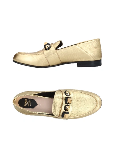 Shop Fendi Loafers In Gold