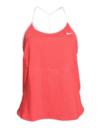 Shop Nike Top In Coral