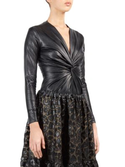 Shop Stella Mccartney Faux Leather Twisted Bodysuit In Black