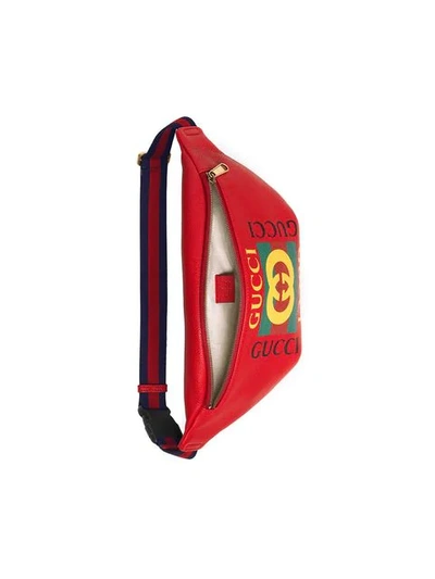 Shop Gucci Print Leather Belt Bag - Red