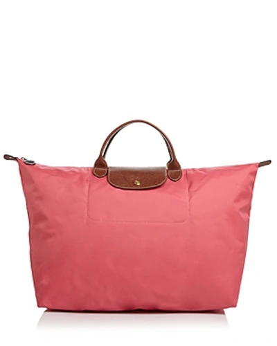 Shop Longchamp Le Pliage Nylon Travel Bag In Flower Pink/gunmetal/gold