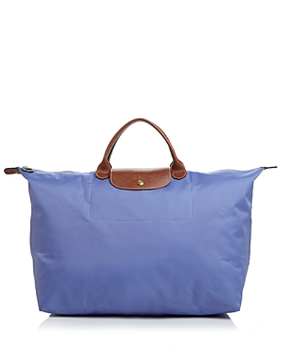 Shop Longchamp Le Pliage Nylon Travel Bag In Lavender Purple/gunmetal/gold