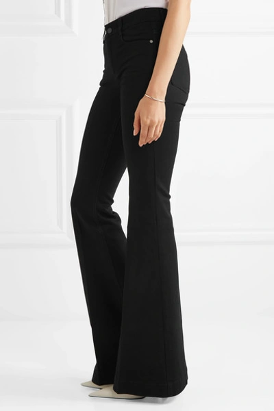 Shop Stella Mccartney The '70s Mid-rise Flared Jeans In Black