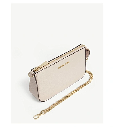 Shop Michael Michael Kors Textured Leather Chain Wallet In Soft Pink