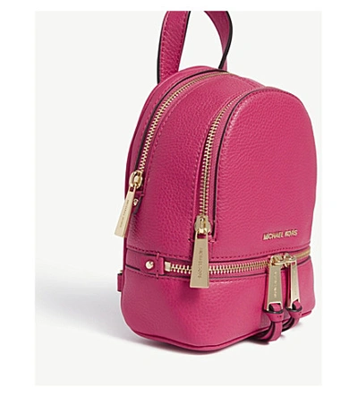 Shop Michael Michael Kors Rhea Extra-small Leather Backpack In Ultra Pink